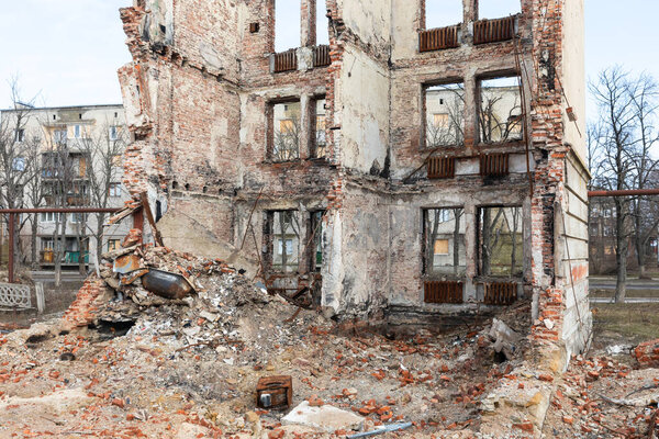 LYMAN, UKRAINE - Feb. 15, 2024: A destroyed apartment building is seen as a result of artillery shelling by Russian troops in Lyman, Donetsk reg.