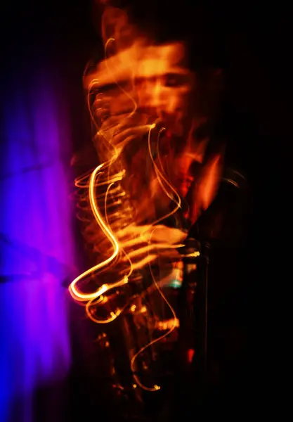 Stock image Jazz musicians improvise on stage. Intentionally motion blurred image.