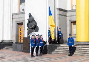 KYIV, UKRAINE - Aug. 23, 2024: A solemn ceremony near the Verkhovna Rada on State Flag Day. Guard of honour during the ceremonial raising of the national flag of Ukraine clipart