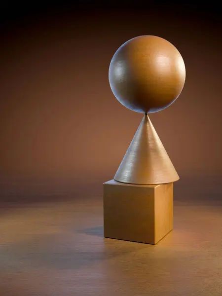 Sphère Cube Cône Éclairés Par Une Lumière Chaude Avec Espace Images De Stock Libres De Droits