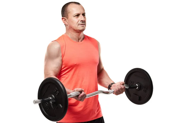 粉红T恤的成熟运动员 带着杠铃和重量进行健身锻炼 与白色背景隔离 — 图库照片