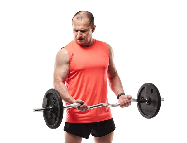 粉红T恤的成熟运动员 带着杠铃和重量进行健身锻炼 与白色背景隔离 — 图库照片