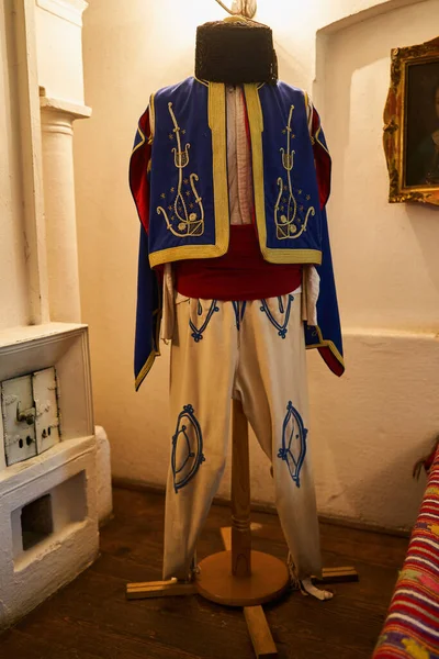 Vintage Turkish man costume on display in an old home