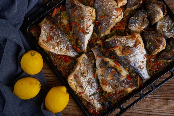 Delicious Oven Cooked Bream Metal Tray Rustic Wooden Board — Stock Photo, Image