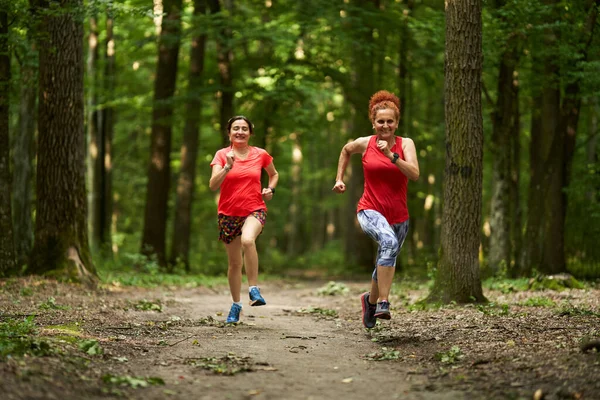 Two Happy Healthy Women Running Jogging Trail Forest — Stock Photo, Image