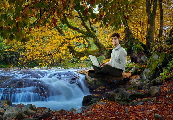 Businessman Working Laptop Sitting River Colorful Autumnal Landscape — Stock Photo, Image