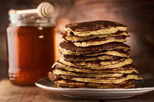 Protein Banana Oatmeal Pancakes Pile Rustic Wooden Board Alongside Jar — Stock Photo, Image