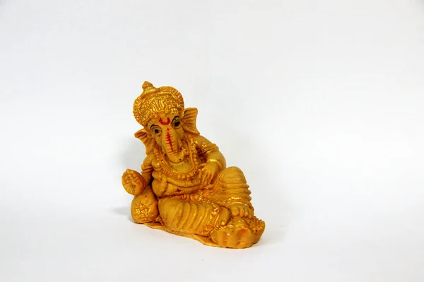 Över Idol Ganesha Lutande Och Avkopplande Ställning Mot Vit Bakgrund — Stockfoto