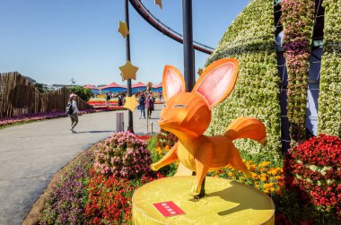 Xinshe, Taiwan - November 28th, 2019: tourists and flowers at Xinshe flower festival, Taichung, Taiwan clipart