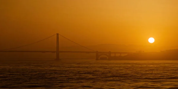 stock image SAN FRANCISCO, CALIFORNIA - April 24, 2023: The Golden Gate Bridge is described in Frommers travel guide as possibly the most beautiful, certainly the most photographed, bridge in the world