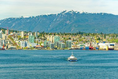VANCOUVER, BRITISH COLUMBIA - 3 Mayıs 2023: Vancouver, Britanya Kolumbiyası 'nın hareketli bir batı kıyısı limanı, Kanada' nın en yoğun ve etnik çeşitliliğe sahip şehirleri arasındadır..