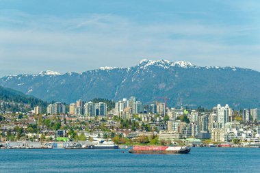 VANCOUVER, BRITISH COLUMBIA - 3 Mayıs 2023: Vancouver, Britanya Kolumbiyası 'nın hareketli bir batı kıyısı limanı, Kanada' nın en yoğun ve etnik çeşitliliğe sahip şehirleri arasındadır..