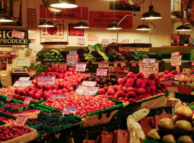 SEATTLE, WASHINGTON - July 3, 2023: Pike Place Market is a public market overlooking the Elliott Bay waterfront in Seattle, Washington. The Market opened in 1907. clipart