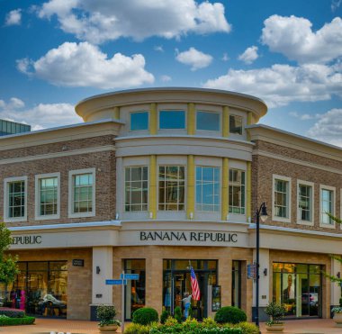 ALPHARETTA, GEORGIA - September 5, 2024: Avalon is a mixed-use development which includes 500,000 square feet of retail, bars, restaurants and services. clipart