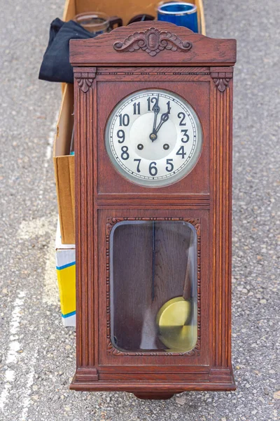 Old Wooden Grandpa Wall Clock With Pendulum at Flea Market