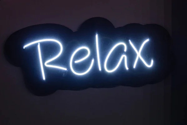 White Neon Sign Relax Black Wall Concept — Stock Photo, Image
