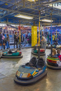 Belgrade, Serbia - December 25, 2022: Small Electric Bumper Cars Ride for Kids in Amusement Park.