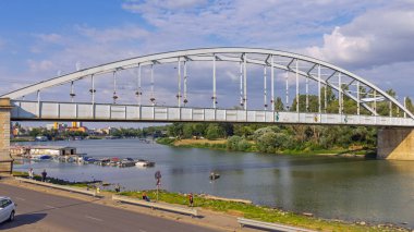 Szeged, Hungary - July 30, 2022: Downtown Bridge Belvarosi Over River Tisza at Hot Sunny Summer Day.