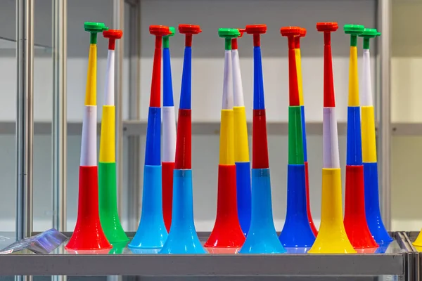 New Long Colourful Plastic Vuvuzela Horn Sale Shelf — Stockfoto
