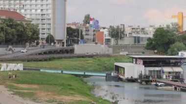 Szeged, Hungary - August 01, 2022: City Life at Hot Summer Day Panorama River Tisza.