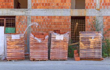 New Bricks Blocks at Pallets Construction Site Building Material