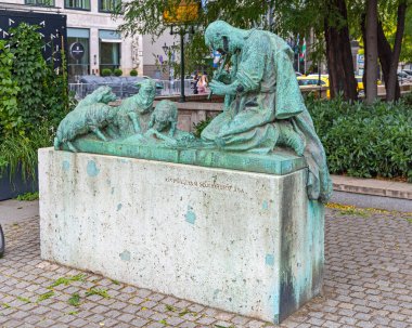 Budapest, Hungary - July 31, 2022: Sculpture of Shepherd Playing Flute for Lambs at Elizabeth Park City Centre.