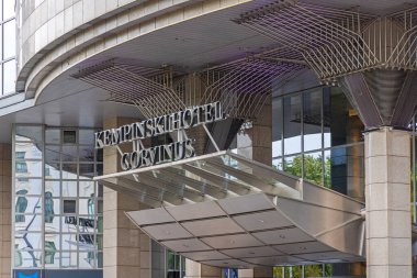 Budapest, Hungary - July 31, 2022: Luxury Five Star Hotel Kempinski Corvinus Sign at Modern Building Entrance in Capital City.