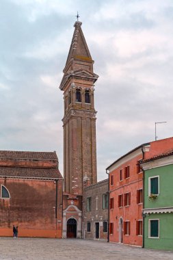 Burano, Italy - January 10, 2017: Bell Tower Landmark Saint Martin Bishop Roman Catholic Church at Burano Island Winter Day.