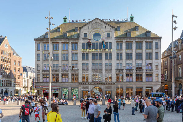 Amsterdam, Netherlands - May 15, 2018: Crowd of People in Front of Madame Tussaud Museum Building Landmark.