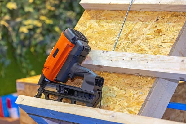 Nail Staple Gun Wooden Roof Construction Site — Stock Photo, Image