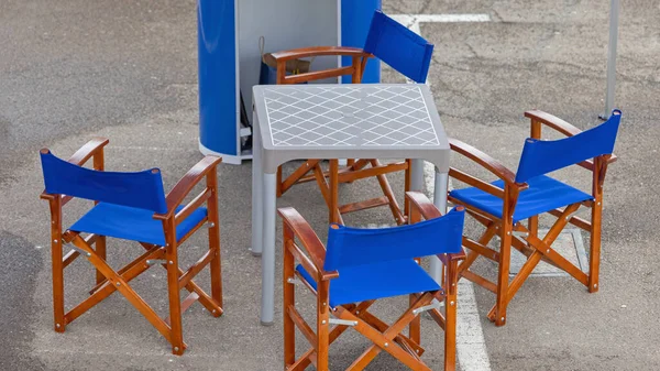 Wooden Folding Director Chairs Blue Canvas Plastic Table — 스톡 사진