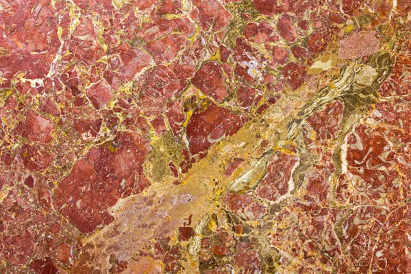 黄金の静脈を背景に豪華なイタリアの赤大理石の石 — ストック写真