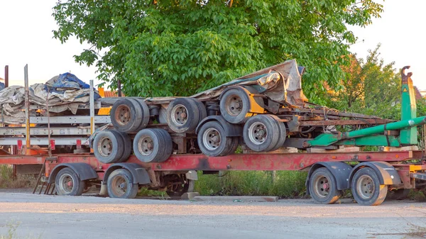 Stacked Flat Bed Cargo Lorry Trailers Wheels Freight Transport — Stock Photo, Image