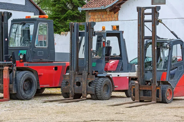 Three Used Red Forklift Tuck Vehicles — Stock Photo, Image