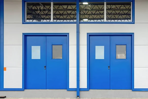 Two Double Doors for People at Distribution Warehouse