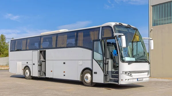 Open Doors at White Coach Bus Passeengers Transport