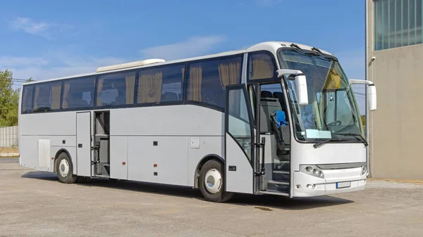 Open Doors at White Bus Coach Passeengers Transportation