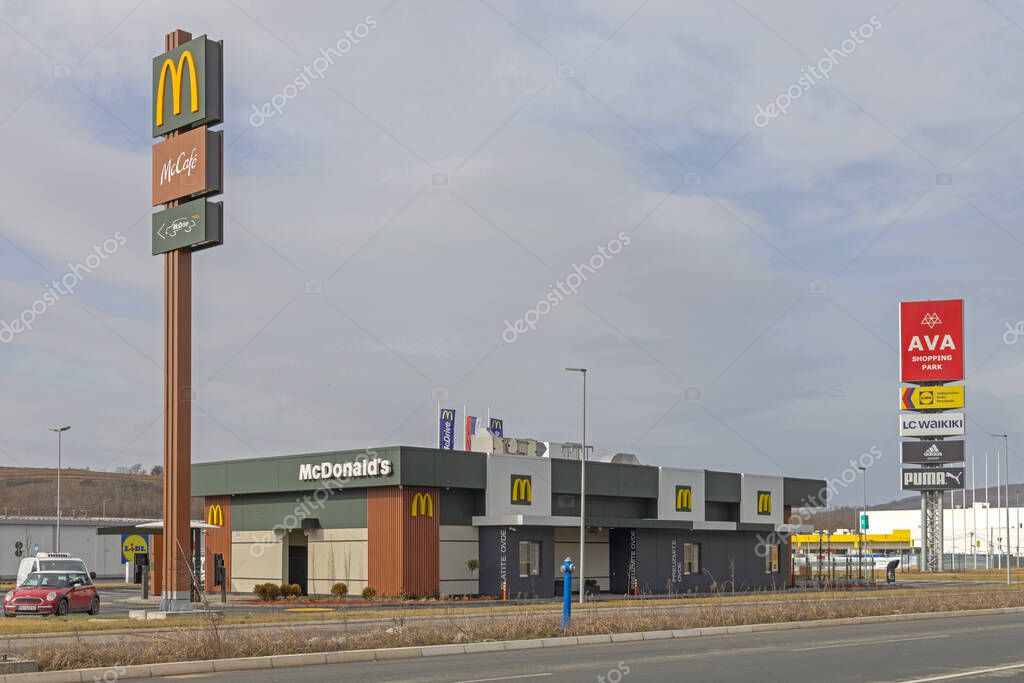 Belgrade, Serbia - February 10, 2024: Fast Food Restaurant McDonalds With Mc Drive at Ava Shopping Park Highway.
