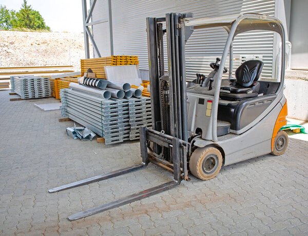 Electric Forklift Truck in Distribution Warehouse