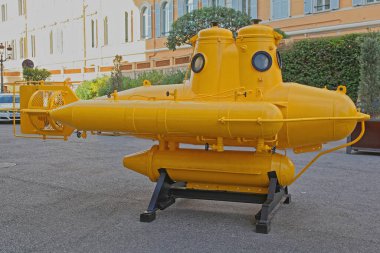 Monaco City, Monaco - January 18, 2012: Anorep Yellow Submarine Submersible Watercraft of Explorer Jacques Cousteau in Front of Oceanographic Museum. clipart