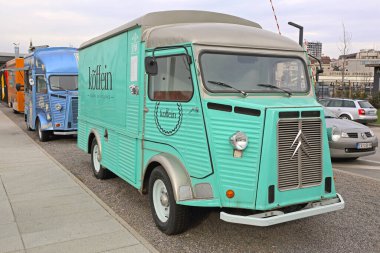 Belgrade, Serbia - February 28, 2016: Vintage Citroen Type H Converted to Coffee Truck Parked in Capital City. clipart