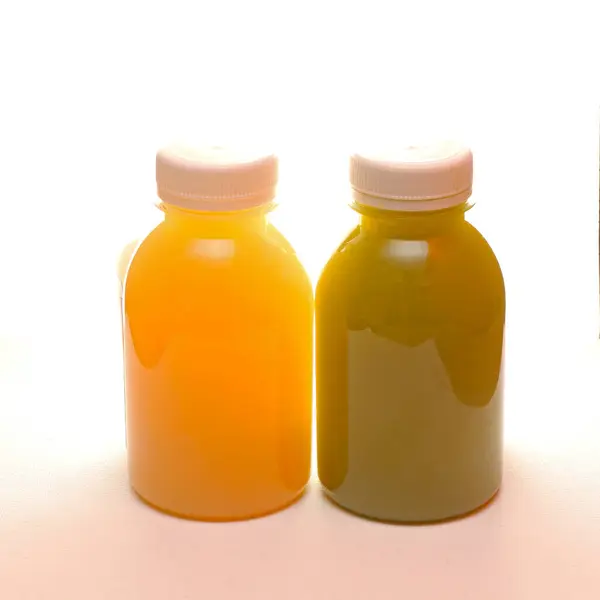 Свіжий Жовтий Фруктовий Зелений Овочевий Сік Пластикових Пляшках Стокове Зображення