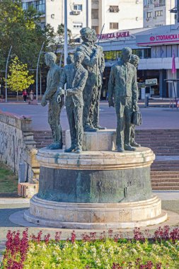 Skopje, North Macedonia - October 23, 2023: Attentators of Solun and Gemidzhii Monument at Vardar River in Capital City. clipart