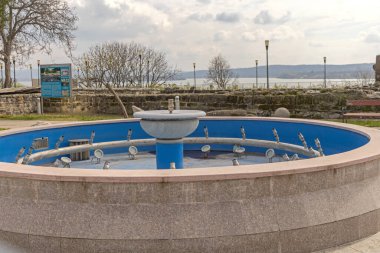 Drobeta Turnu Severin, Romania - March 15, 2024: Artesian Fountain Without Water in Front of Local History Museum Landmark. clipart