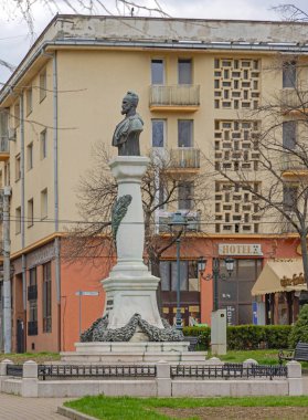 Drobeta Turnu Severin, Romania - March 15, 2024: Monument Bust of Decebal Historic Landmark at Town Park Spring Day. clipart