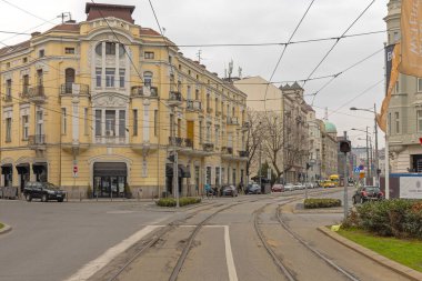 Belgrade, Serbia - March 11, 2024: Tram Tracks at Savamala Downtown Old Town at Winter Day in Capital City. clipart