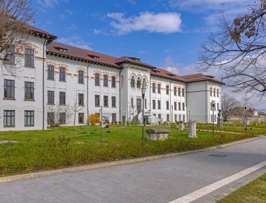 Drobeta Turnu Severin, Romania - March 14, 2024: Local History Museum White Building and Aquarium at Independentei Street Historic Landmark. clipart