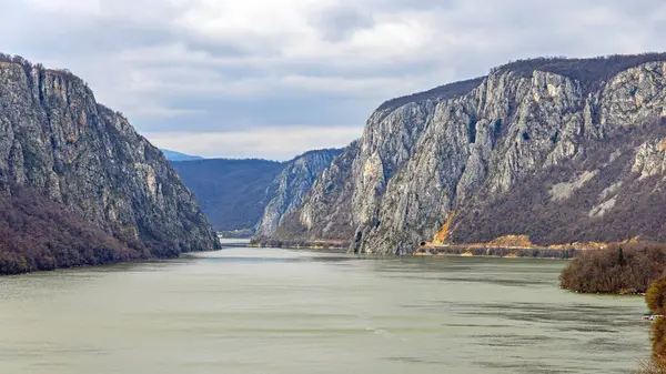 stock image Donji Milanovac, Serbia - March 14, 2024: Aerial View of Danube RIver Kazan Gorge Djerdap National Park at Cloudy Spring Day Nature.