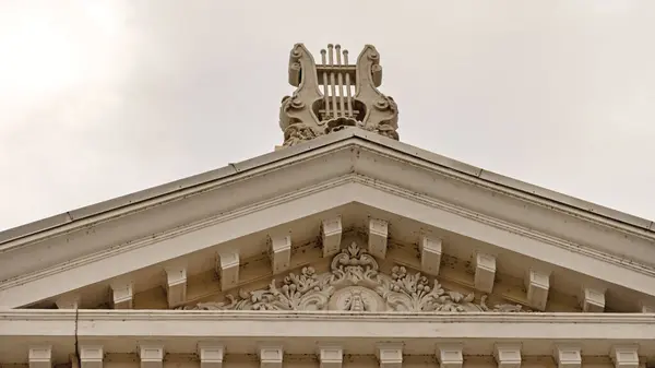 stock image Drobeta Turnu Severin, Romania - March 15, 2024: Cultural Palace Teodor Costescu Performing Theater Building Top at Boulevard Carol Close up.