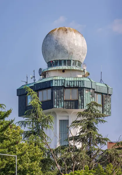 stock image Belgrade, Serbia - June 19, 2023: Weather Surveillance Doppler Radar Antenna at Meteorogical Station Tower.